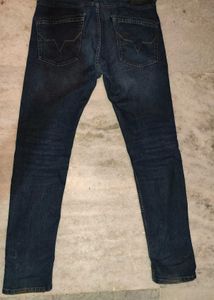 Distressed Dark Wash Jeans