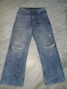 striped halter crop top and blue ripped jeans