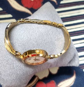 Vintage Raga Titan Gold Watch