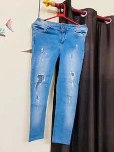 Select Skinny Distressed Jeans
