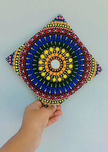 Its a handmade mandala art or dot art