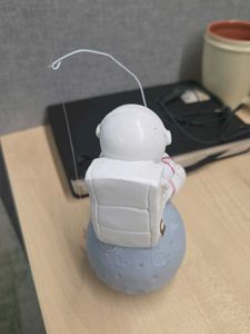 Astronaut Fishing on the Moon Figurine