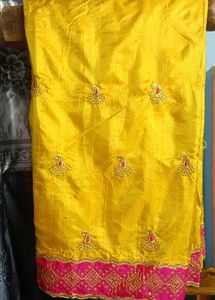 Yellow Silk Saree with Pink Embroidered Border