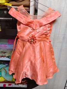 Beautiful shine frock with net shoulder cutoff