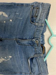 Ripped Knee Jeans