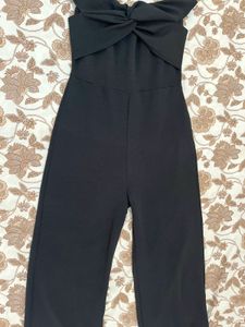 Elegant Black Strapless Jumpsuit with Bow Detail