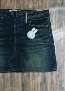 Dark wash denim mini skirt