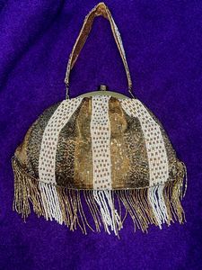 Anekaant Gold-Toned Embellished Tasselled Clutch