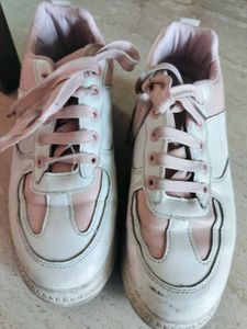 good white color sneaker shoes