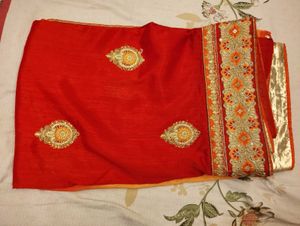 Elegant Red Saree with Gold Embroidery