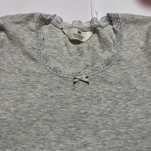 Light grey ripped short sleeve top