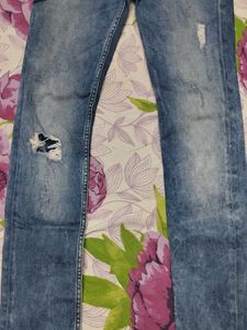 Distressed blue denim jeans 👖