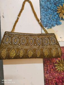 Clutch With Stone Work