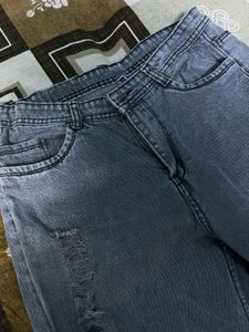 grey rough jeans