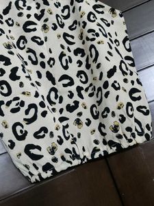 Animal Print Sleeveless Oneside Knot Top