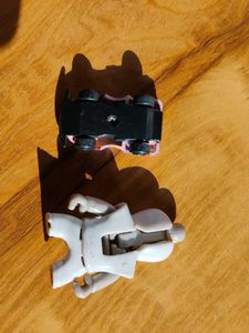 Toy Car and Spaceman Figurine