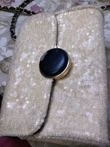 Sparkly sling handbag