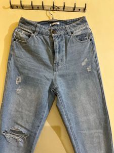 Ripped Light Wash Denim Jeans