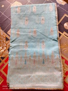 Elegant Aqua Saree with Intricate Paisley Detail