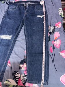 Ripped Blue Denim Jeans