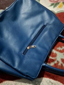 Blue Quilted Handbag of Nelle Harper