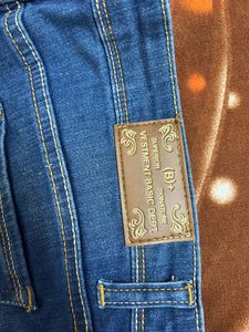 Blue Distressed Denim Jeans