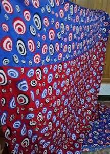 queen size. Colorful  red with  blue color Bedcove
