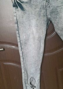 light grey, acid-wash or faded jeans.