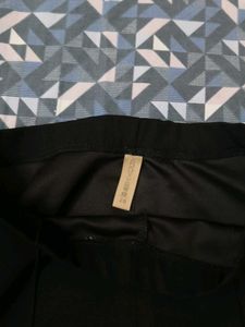 Tourser Pants With Little Flare At The Bottom