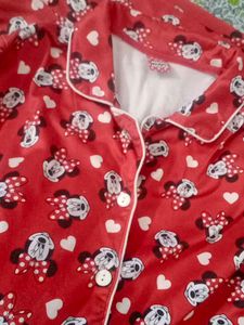 a red night suit gives cozy vibe wth detailings of