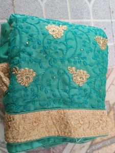 Elegant Teal Embroidered Saree