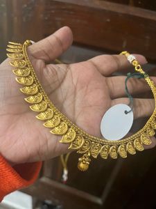 Gold-toned Godess carving Necklace