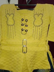 Denim Jeans With Yellow Top.
