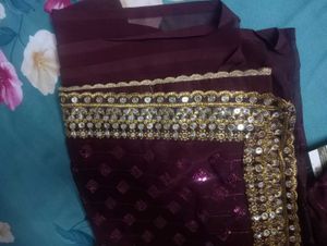 Elegant Brown Embellished Saree