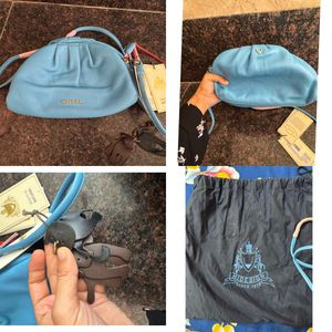 Hidesign sling with leather charm n dust bag