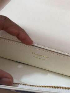 Miss Dior Clutch sling bag