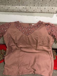 peach fabcy top
