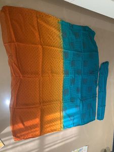Lovely green and yellow bandheej Saree