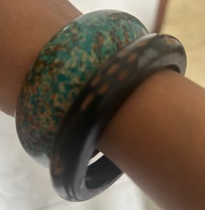 combo of wooden, golden and designer bangles