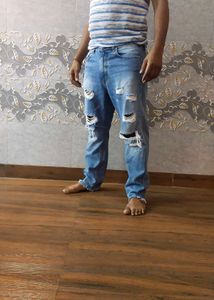 Ripped Blue Denim Jeans