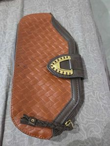 Brown Woven Clutch