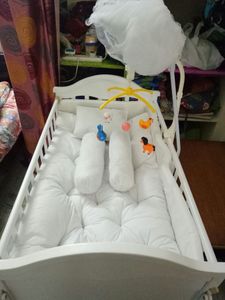 White Baby Crib with Mobile