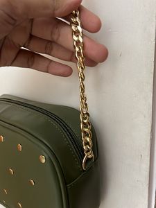 Party Wear Green Sling With Metal Chain Detail