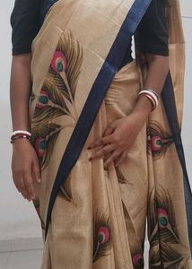 Elegant Beige Peacock Feather Saree