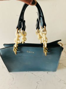 Stylish Cara Handbag with Chain Straps