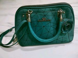 Stylish Teal Handbag with Flower
