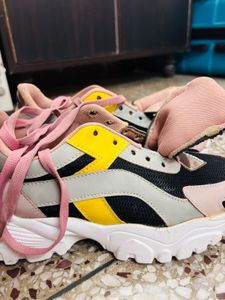 Well-loved Pink Sneakers