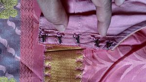 Pink Floral Saree with Gold Border