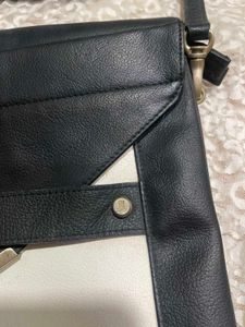 100% leather sling bag