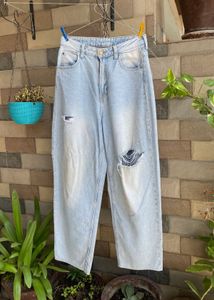 Ripped Light Wash Baggy Jeans